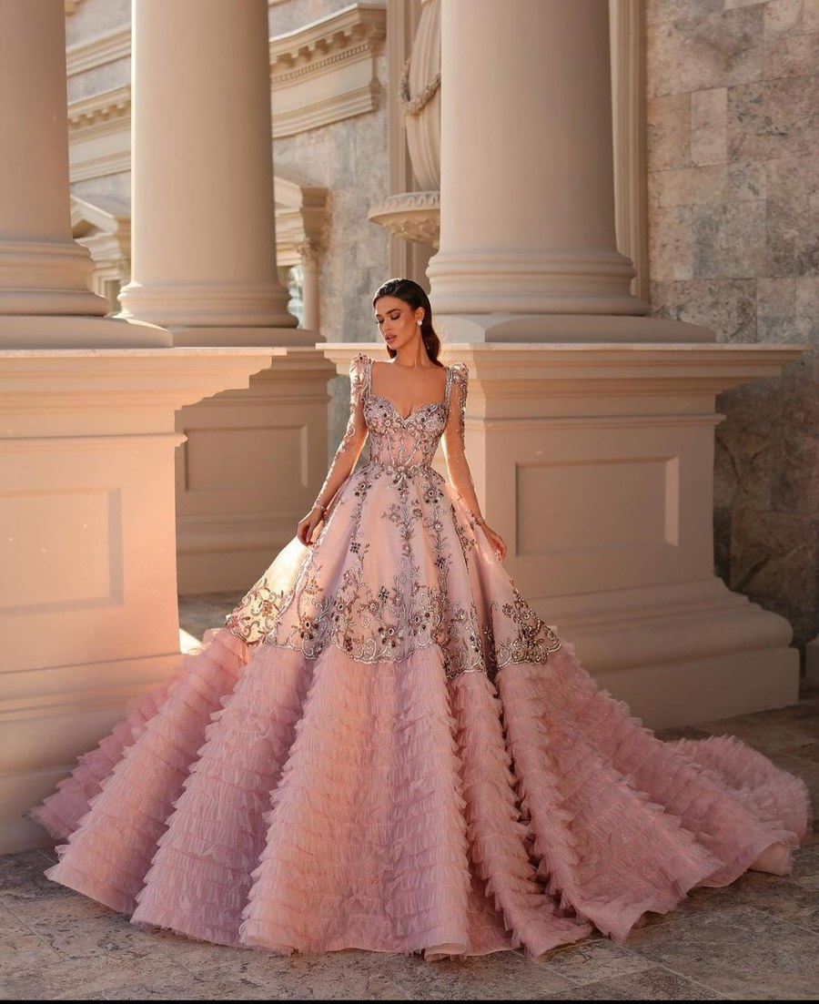 Client wearing Lumièra pink palace ballgown